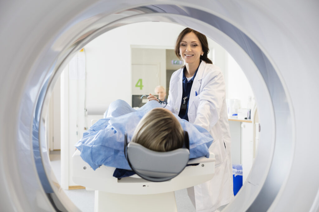 Home - Allied Health Solutions Imaging tech specialist preparing patient for MRI