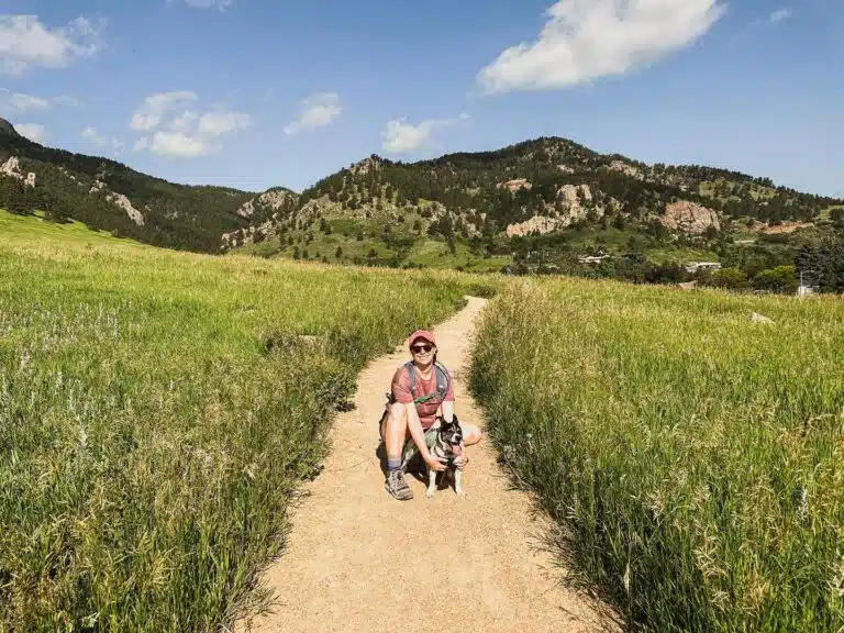 Jess Johnson, RN, hiking with her dog in Colorado