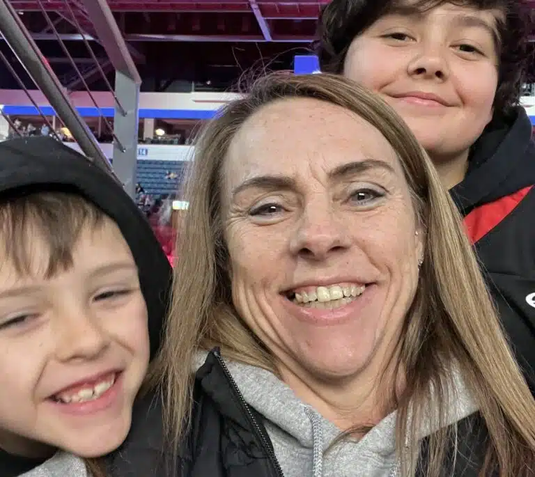 Collections Manager Donna Hignite with children