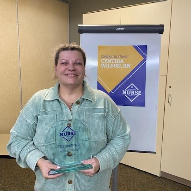 Cynthia Wilson, TRS Healthcare Nurse of the Year 2023 Cynthia Wilson with her TRS Healthcare Nurse of the Year 2023 award at a celebration in Kansas
